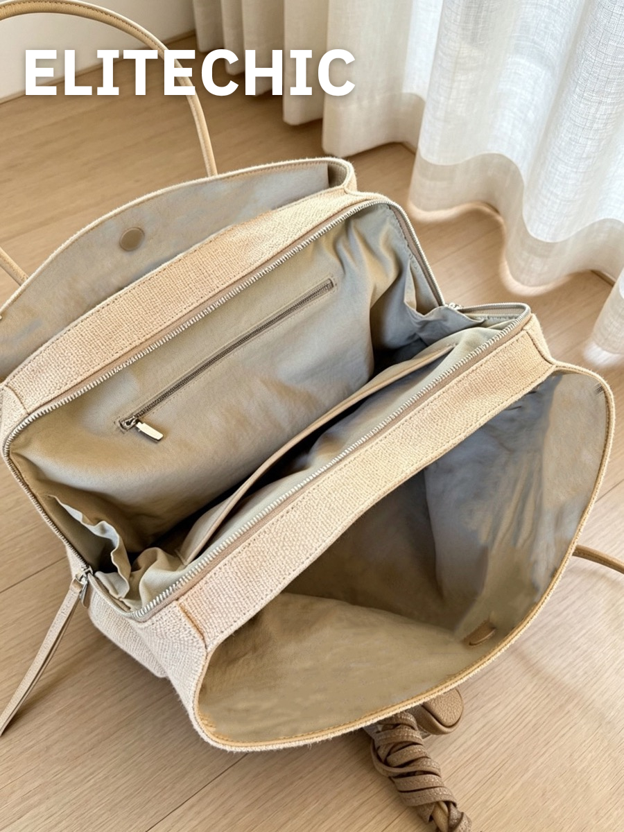 Bên trong túi tote linen màu be với các ngăn