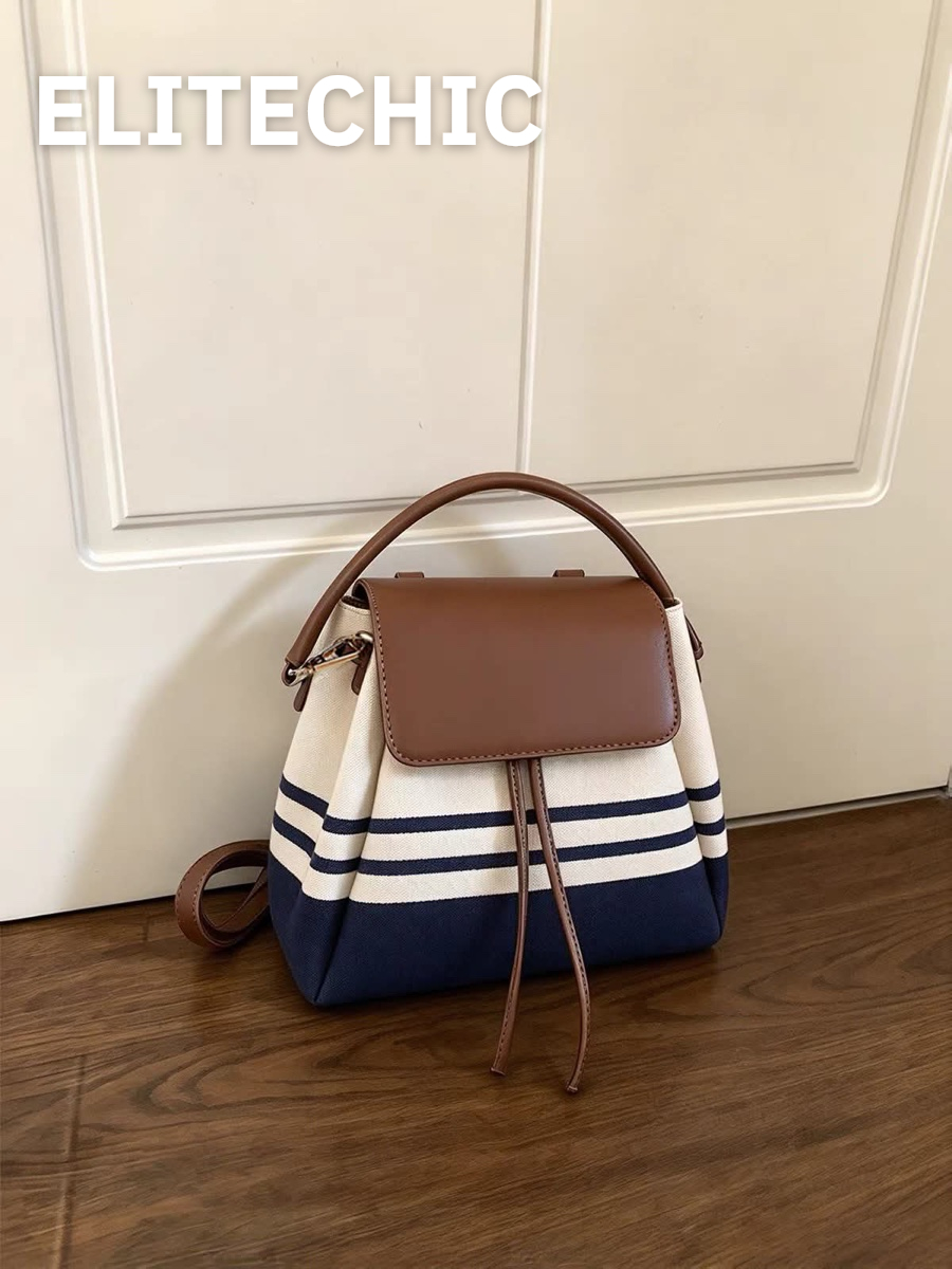 Túi canvas kẻ sọc navy với quai xách da nâu